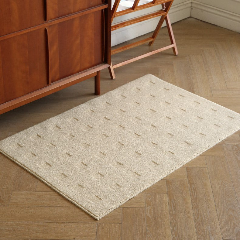 Thảm dệt Dash Rug màu trắng kem tối giản trên sàn gỗ
